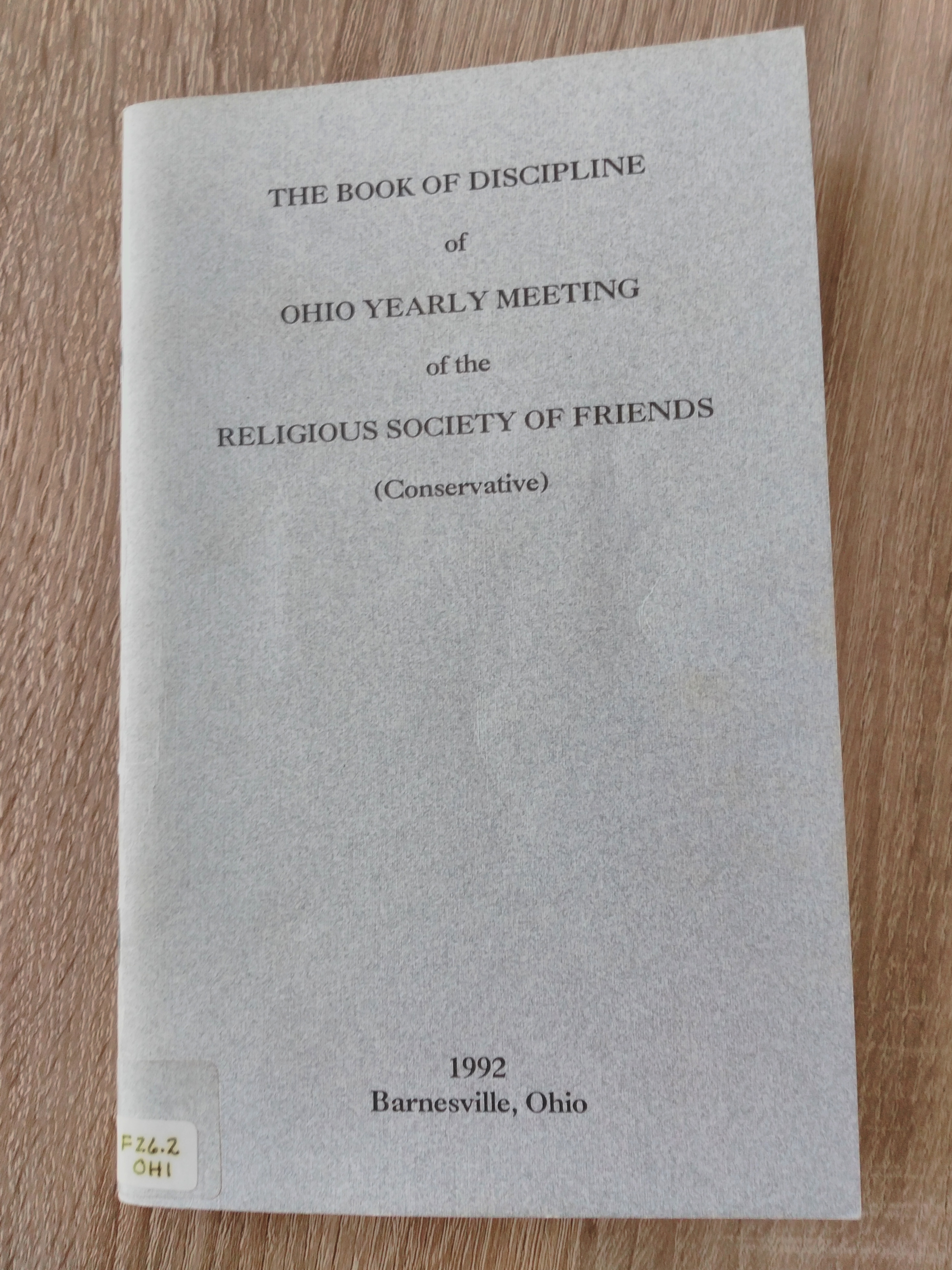 a plain grey book cover with black text which reads "The book of discipline of Ohio Yearly Meeting of the Religious Society of Friends (Conservative), 1992 Barnesville Ohio".
